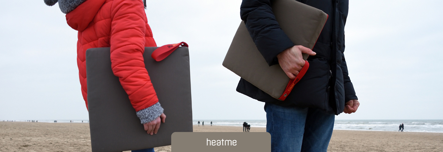 Kabelloses Akku-Heizkissen fuer kalte Tage am Strand von heatme